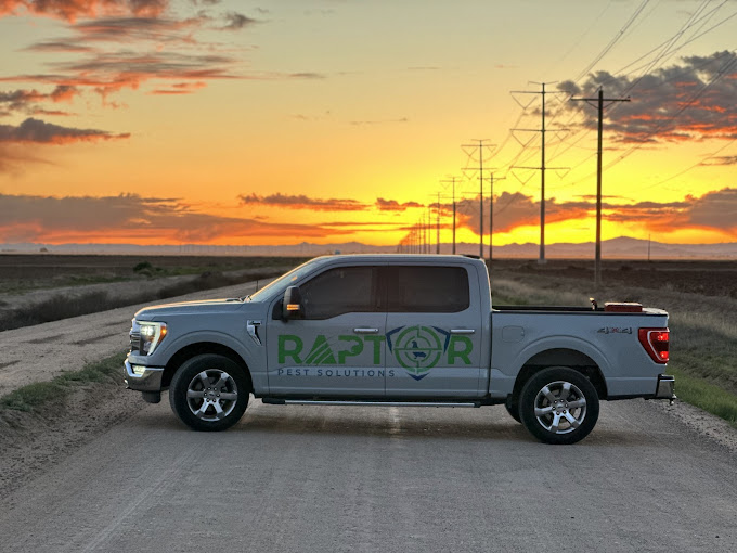 Raptor Pest Solutions service truck at sunset in Arizona